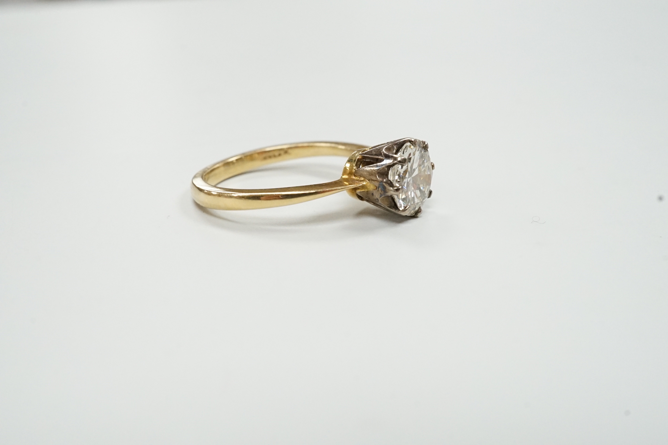 A yellow metal and solitaire diamond set ring, size K/L, gross weight 3.3 grams